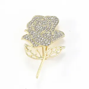 Rhinestone rose brooch detail view, elegant gold floral corsage pin for jacket clothing decor.