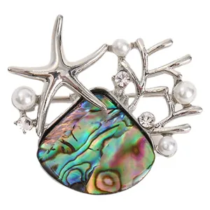 Exquisita broche de concha de perla de estrella de mar plateada joya de moda mujer