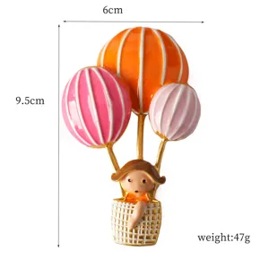 Cute hot air balloon girl brooch enamel pin for clothes decoration and fashion accessories.