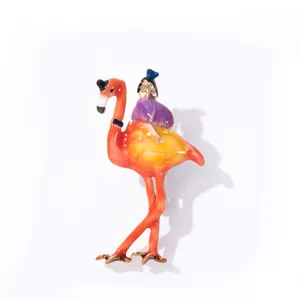 Exquisite details of the vibrant flamingo character brooch showcasing fine enamel design.