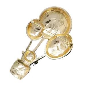 Gold-toned cartoon hot air balloon brooch back view, secure pin clasp design ideal for apparel decoration.
