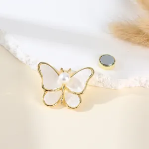 Butterfly magnetic brooch and scarf buckle with pearl inlay, strong clasp accessory.