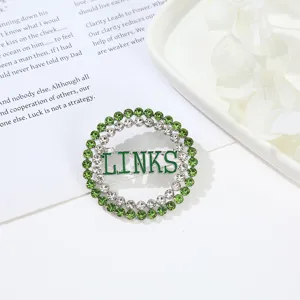 European and American foreign trade round hollow alloy crystal letter brooch pin gift.