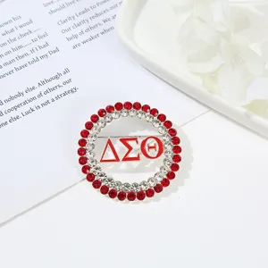 Round alloy rhinestone Greek sorority brooch pin, elegant fashion accessory for women clothing.