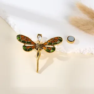 Exquisite dragonfly magnetic brooch with colorful enamel wings and shiny crystal.