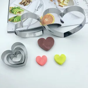 Stainless steel heart-shaped cookie cutters set, durable baking mold for cakes and biscuits details.