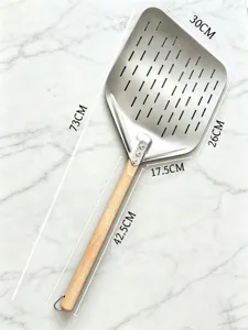 Perforated stainless steel pizza peel featuring a long wooden handle and precise dimensions.