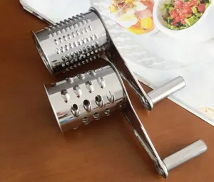Stainless steel rotary cheese grater close-up detail shot showing durable metal roller blades.
