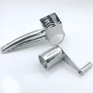 Stainless steel rotary cheese grater detail view showing metal drum and handle structure