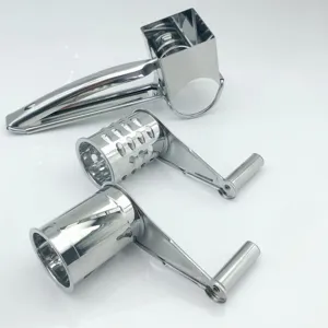 Stainless steel rotary cheese grater detail, kitchen tool with drums for easy shredding.