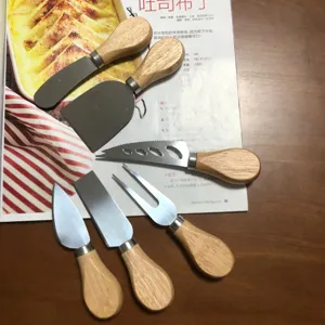 Stainless steel cheese knife set with wooden handle for butter cake and pizza slicing.