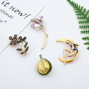 Exquisite alloy crystal brooch set featuring floral and moon designs, elegant accessories.