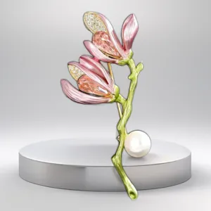 Elegant magnolia flower brooch with pink crystals, pearls and green enamel for women suit.