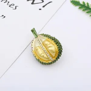 Durian brooch detail view, alloy drip oil and rhinestone inlay, exquisite fashion accessory.