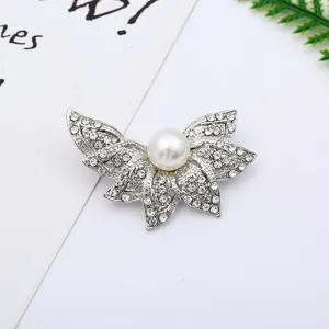 Exquisite pearl rhinestone brooch detail, elegant silver alloy floral pin for women.