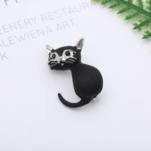 Leuke zwarte kat brochespeld met groene kristallen ogen, elegante legering corsage accessoire.