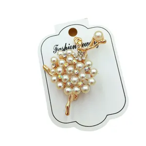Elegante spilla ballerina con perle finte e strass scintillanti accessorio moda femminile.
