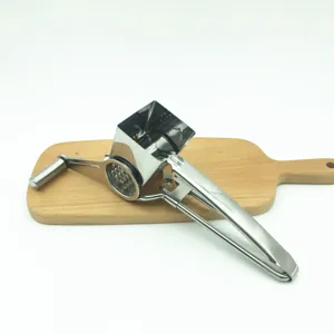 Stainless steel rotary cheese grater detail view, manual shredder showing close-up metal drum.
