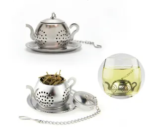 Stainless steel teapot tea infuser detail view, fine mesh strainer with chain for loose leaf tea.