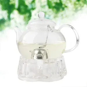Clear glass teapot with stainless steel infuser and glass base for brewing loose tea.