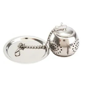 Stainless steel teapot shaped tea infuser with chain and drip tray for loose leaf tea brewing.