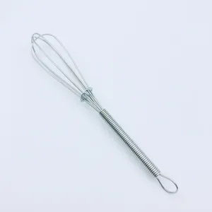 Stainless steel mini manual egg whisk with spring handle for professional kitchen baking use.