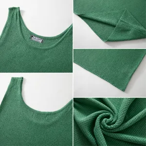 Green knitted tank top detail shot, breathable mesh fabric, sleeveless round neck design.