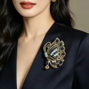 Retro luxury rhinestone butterfly brooch for women, elegant suit jacket pin accessory main view.