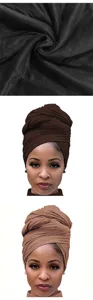Fabric texture close-up and model wearing details of solid color stretch turban cap.