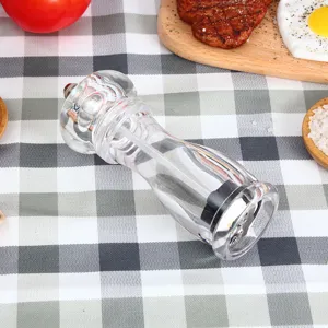 Clear acrylic manual pepper mill salt grinder for kitchen cooking spices and seasoning tools.
