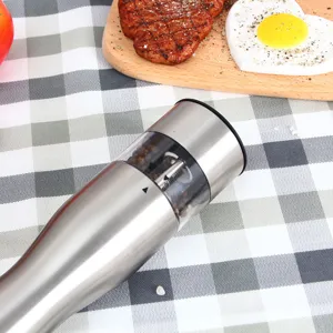 Stainless steel electric pepper grinder detail, clear view window for kitchen spices.