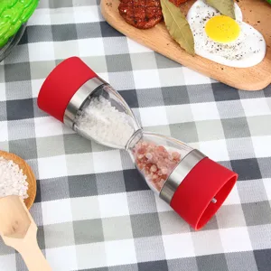 Moulin à sel et poivre manuel à double embout avec embouts en silicone rouge pour cuisine.