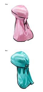 Silk satin durag with black piping and long tail design, variant in pink and blue colors.