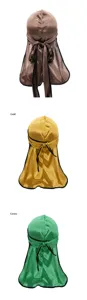 Close-up detail of silky durag long tail and edge binding, smooth satin fabric texture.