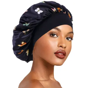 Detail view of the wide-brim satin sleep bonnet featuring colorful butterfly prints for hair care.