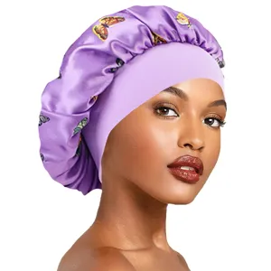 Satin sleep bonnet with wide band and butterfly print, comfortable hair care cap for night.