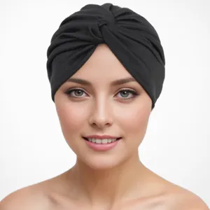 Black solid color twist turban hat for women, elegant fashion headwrap and India cap.