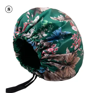 Floral satin sleep bonnet with adjustable elastic strap, soft hair care cap for women.