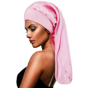 Detailed view of the pink satin long sleep cap showing soft fabric and elastic wide brim.