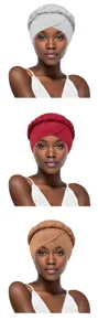 Detailed view of the fashionable braided turban cap showing various colors and textures.