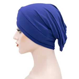 Blue turban hat for women, soft stretch chemo cap and comfortable head cover for daily wear.