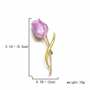 Elegant tulip brooch with purple flower head and gold stem, perfect jewelry detail view.