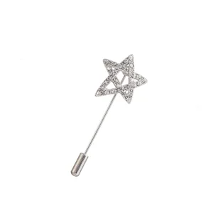 Close-up detail of a sparkling rhinestone star stick pin, vintage alloy brooch accessory.