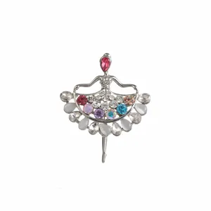 Detailed close-up of shiny rhinestone ballerina brooch with sparkling multi-color crystals.