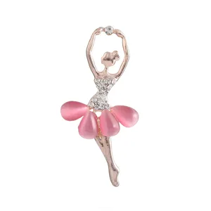 Cute ballerina girl brooch detail, rose gold alloy with pink cat eye stone skirt and rhinestones.