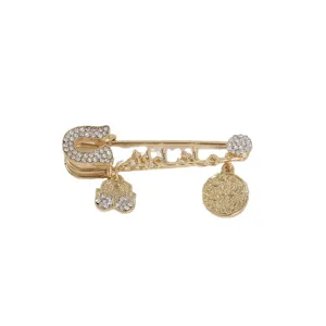 Gold rhinestone safety pin brooch with hanging charms, elegant Islamic style jewelry.