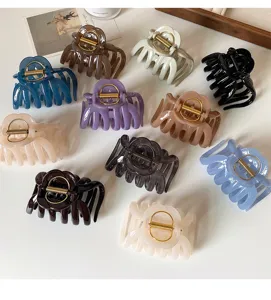 Detail view of large resin hair claw clip with strong spring, elegant daily hair accessory.