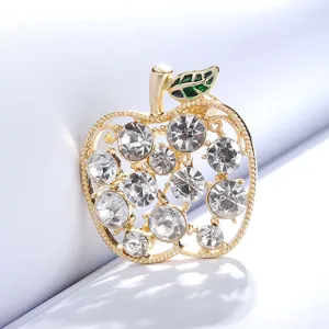 Gold rhinestone apple brooch detail, elegant crystal pin for women winter coats and cardigans.