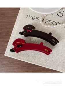 Cute puppy banana hair clips with rhinestone bowknot design, elegant hair claws for women.
