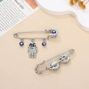 Prachtige boos oog hamsa hand broche met strass kristal legering mode sieraden accessoire.